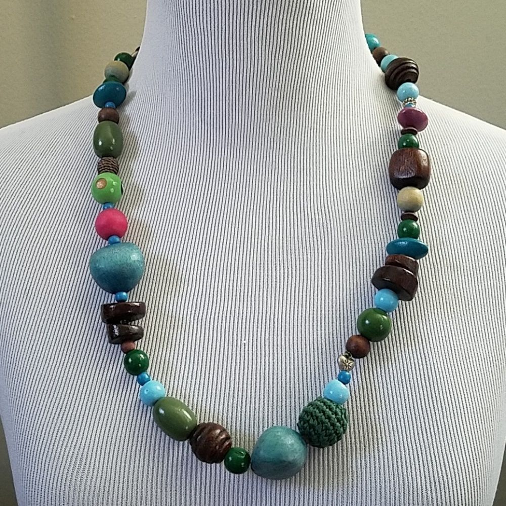 Wood and natural fiber necklace brown green pink